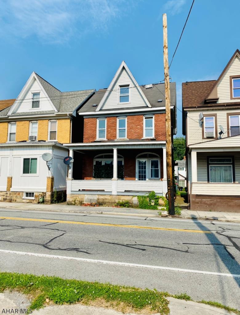 Large 4 bedroom house with fenced-in yard and off-street parking under covered carport. Great home for first time buyers or investors.