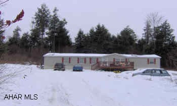 Beautiful 28x76 doublewide on 5.6 wooded acres.  Rt 53 to Market Street - right to top of hill - left on Shady Lane - house on left - sign on.