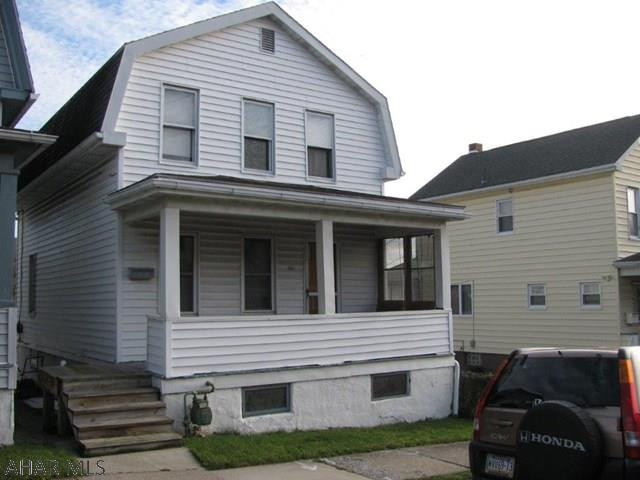 Great fixer upper in nice neighborhood! Fenced lot w/ block garage. This home features LR.,DR., kitchen, 3 BR & full bath! Kitchen is gutted and ready for new! Covered porch, vinyl siding and quiet street! priced to sell at $39,900