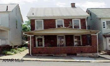 Solid brick home w/new windows, furnace, hot water heater.  Nicely decorated, updated kitchen and bath, fenced yard, off street parking, new carpet. Great starter home priced to sell.  Take a look & make an offer!