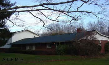 Brick rancher with beautiful great room addition country setting. Large level lot with fruit trees 3 care integral garage.