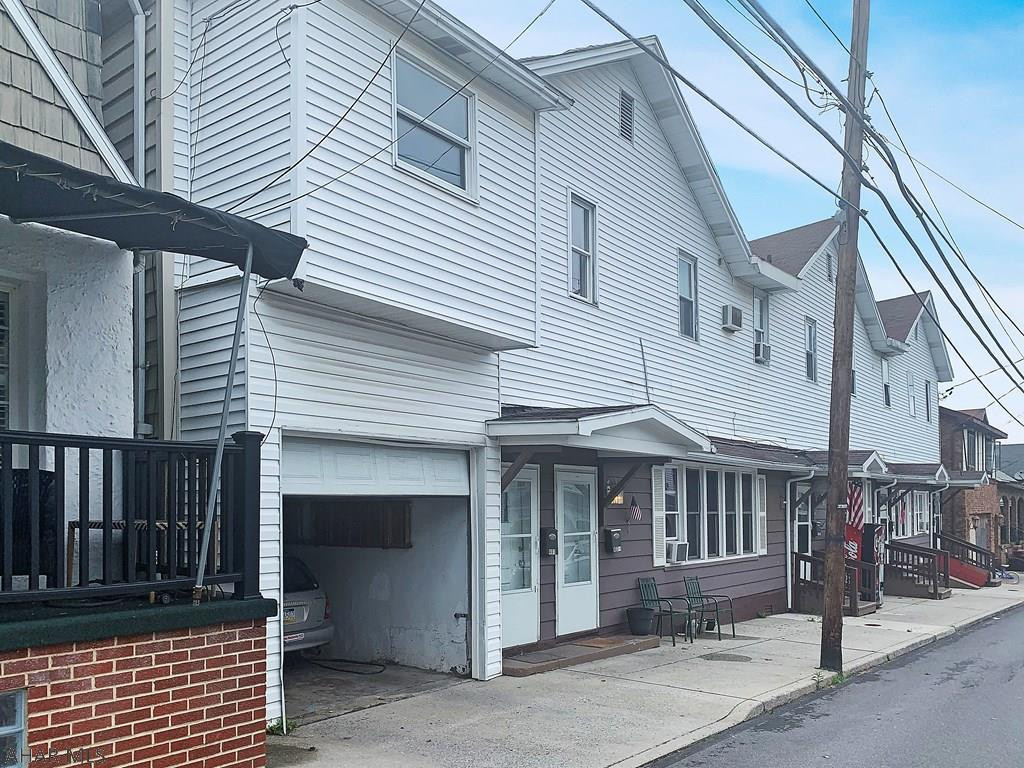 5 Units which have historically generated good rental income. Parking lot at the end of the block is included in the sale. Extra income from coin operated washer dryer x2. Units are a good mix of 2 and 3 Bedroom and 1 even has a garage. New gas boiler. Tenants pay electric and cooking gas. Rents total $3414 monthly. Expenses are Gas $383 and water $600. Add your taxes and insurance for excellent cash flow.