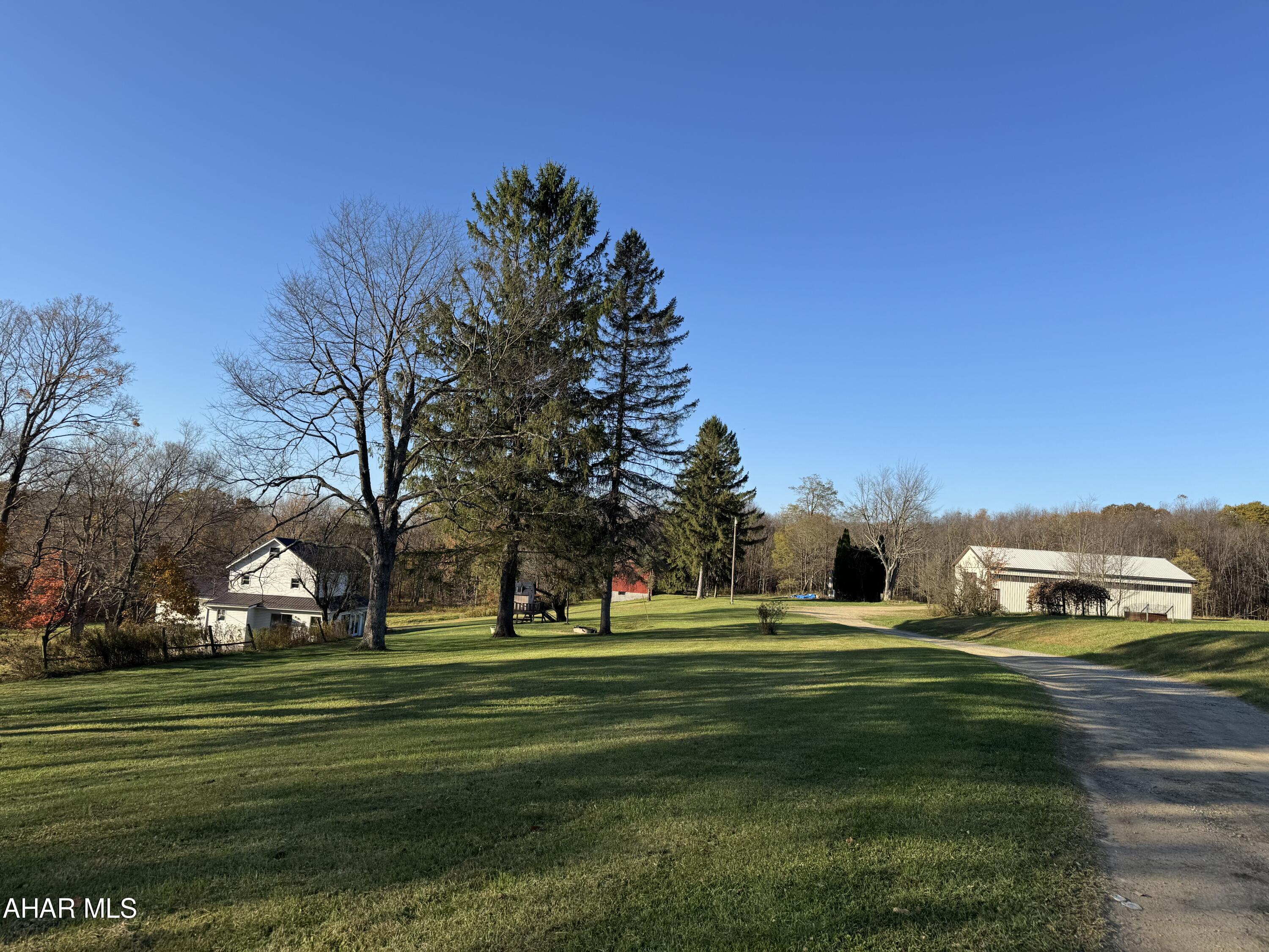 Gentlemans farm in a private location. The property consists of partially remodeled 4 bedroom 1.75 bath farmhouse on 33 acres+/-. The property includes a 20 x 30 barn with shed, a 40 x 64 pole building, and a farm pond.  Great horse property with plenty of room to ride. Fields are beautiful with a slight slope. Some wooded ground with good hunting. Water supply is a spring. New permitted septic system installed 10-19-24
