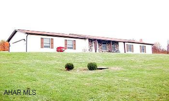 1 story ranch Lovely well-kept home a residential neighborhood.  Large finished basement with kitchen area for entertaining.  1st floor laundry room.  Basement refrig. will stay, kitchen will not stay.  Electric is $120 mo. budget.   There are 4 Thermal Heat Storage Units (2 on each floor) that stores heat in a ceramic heat unit on off peak hours & helps heat on peak hours.