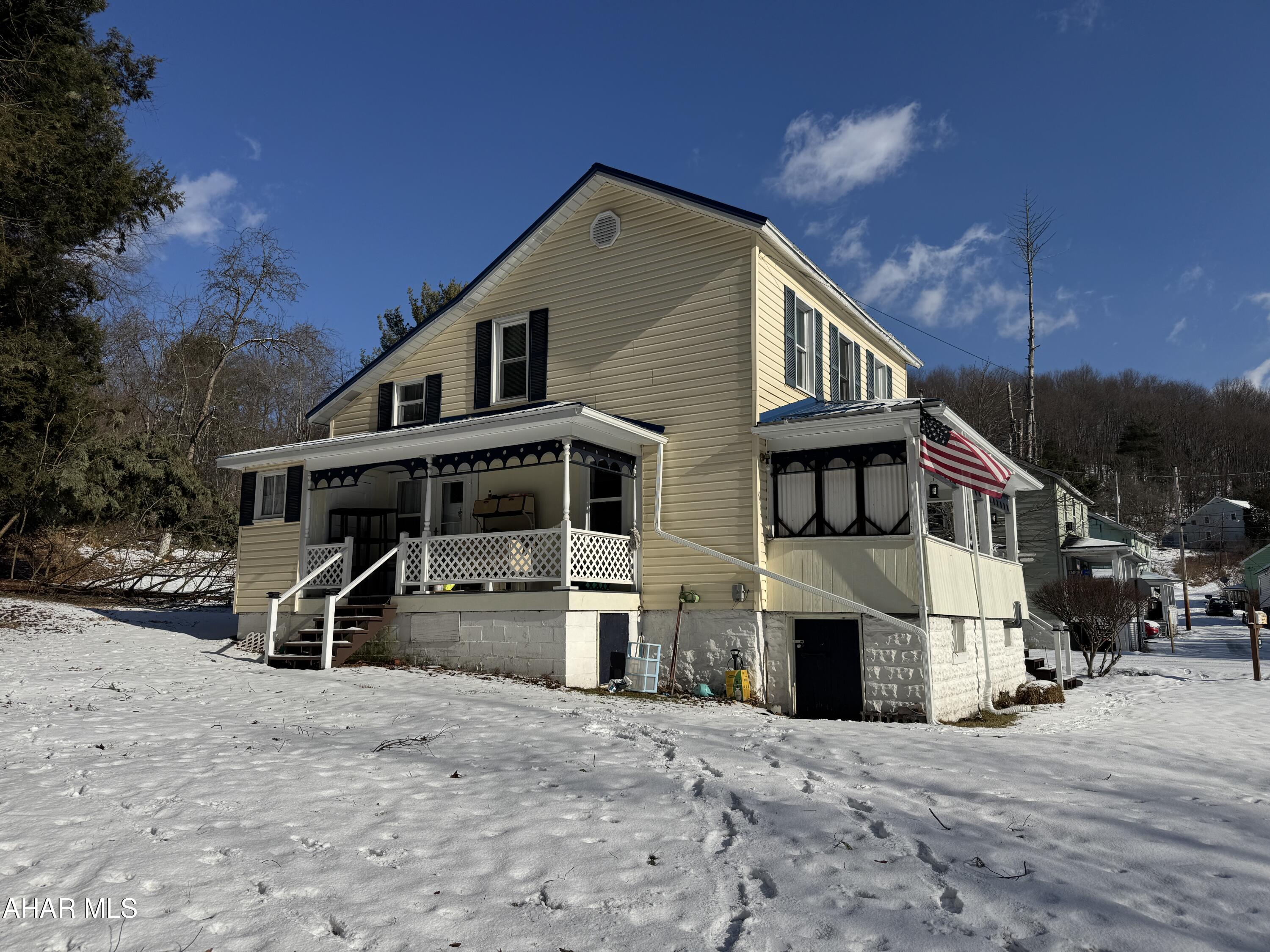 Vinyl sided, two story home featuring living rm, kitchen, laundry room, newer bath and 1st floor bedroom. 2nd floor consists of 3-BR and storage room. Full basement. OHW heat. Metal roof. Utility shed. 1+ car carport. Nice front and side porch. Nice size lot.