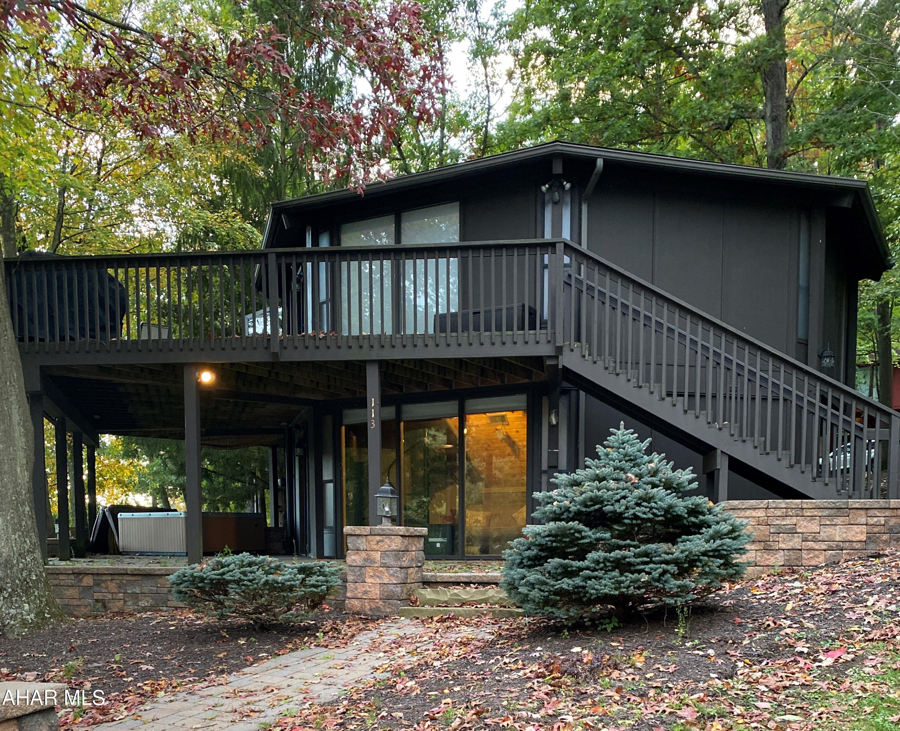 This utopian topsider provides the perfect home to relax and enjoy the serenity that the area has to offer.  Enjoy the view of the Donald Ross ''Old Course'' from the warmth of the sunroom or with the fresh air from the deck.  After a day of enjoying the local fare of historic Bedford relax and enjoy a drink by the firepit as the day slips into night.  Invite guests over to stay as each bedroom offers its own bath to provide privacy. Enjoy the natural beauty and amenities of the adjacent Omni Bedford Springs Resort & Spa, including the stocked Shrober's Run.  The European built sauna offers a soothing end to a day of fun at the local Blue Knob Ski Resort or just enjoying the many hiking/biking trails minutes from your door.