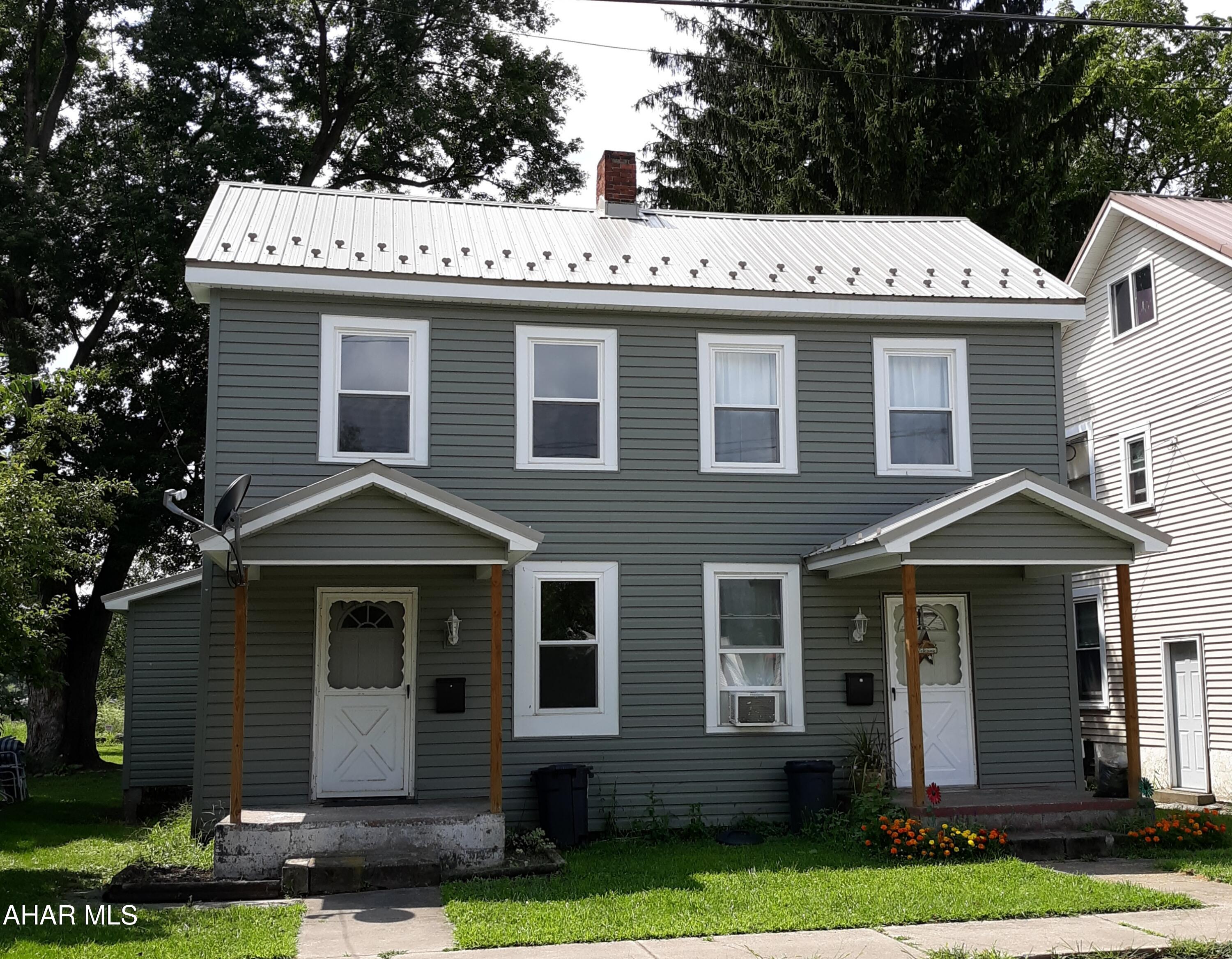 Duplex For Sale in the Borough of Hollidaysburg ! This 2 story 2 unit 2 bedrooms  has all separarte utilities with tenants paying everyting except trash. Updated windows,  metal roof and siding. Off street parking and shed for each unit ..Listed for $159,500