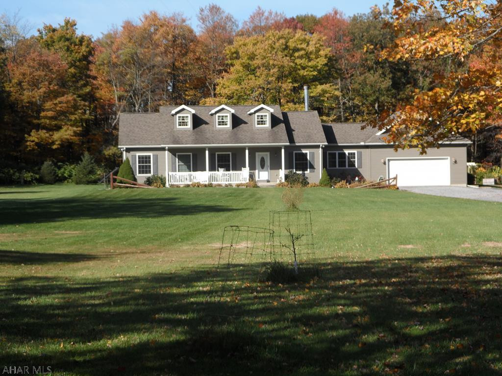 Beautiful 3BR 3BA on 6 acres.  Home offers custom make kitchen, large pantry room, 2 car attached & 2 car detached garage, many outbuildings for horses, goats, chickens, large corral area, garden and a pond.  All you would want & more in country living. Latest mechanics come with this home.  Geo thermal heat, radiant heat on basement flooring, solar panels, tankless HW heater, Kinetic water system and so much more!