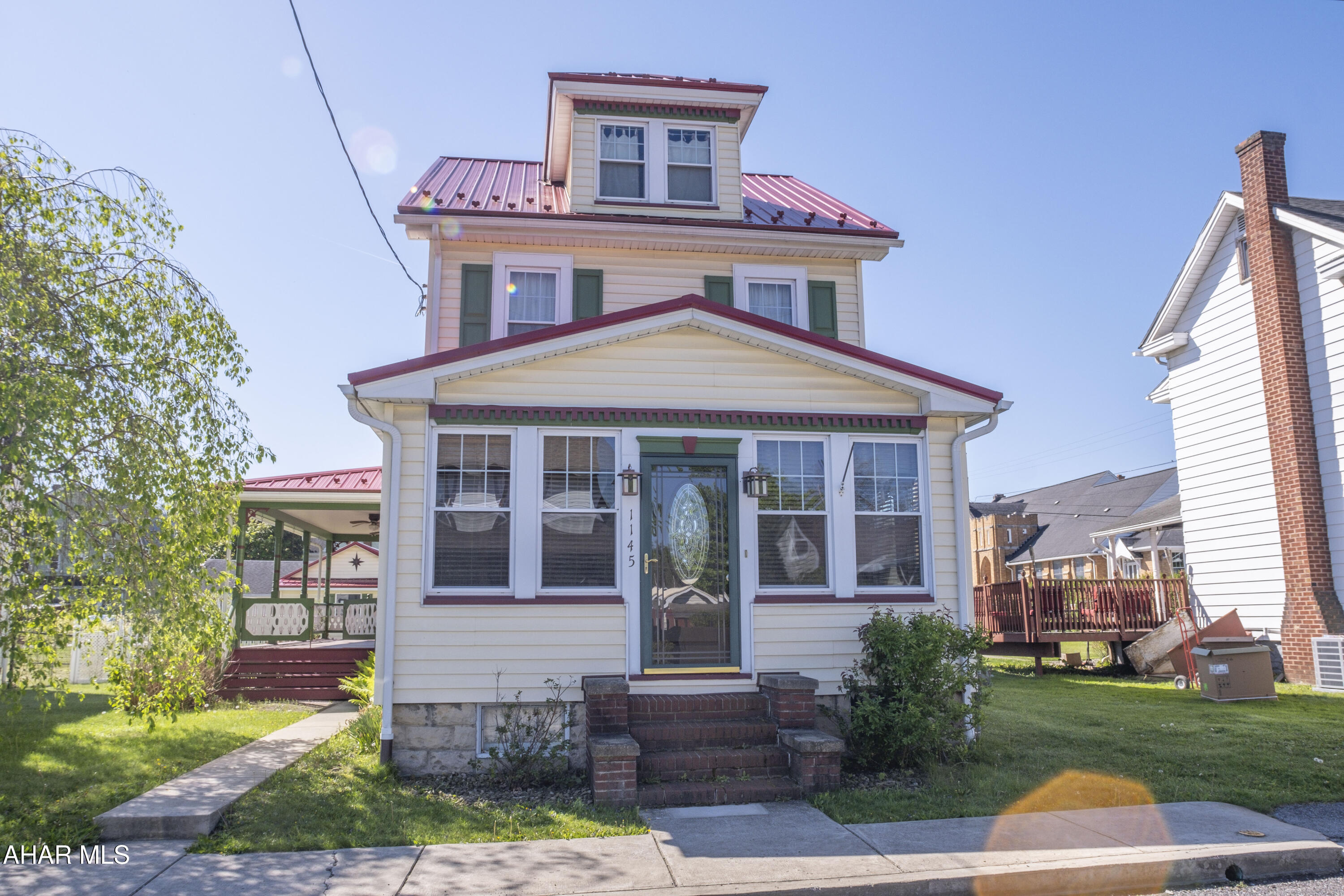 Welcome to this charming 3-bedroom home located in the Borough of Duncansville. Featuring beautiful original woodwork that adds timeless character, this home blends classic charm with practical updates, including a newer roof installed in 2021. Inside, you'll find a heated enclosed porch that provides flexible, year-round living space. Enjoy relaxing or entertaining on the spacious back porch. This property includes a one car garage and additional shed for extra storage. A wonderful opportunity to own a home with both charm and functionality. with a few cosmetic updates, this home is ready to truly shine. Don't miss this chance to make it your own!