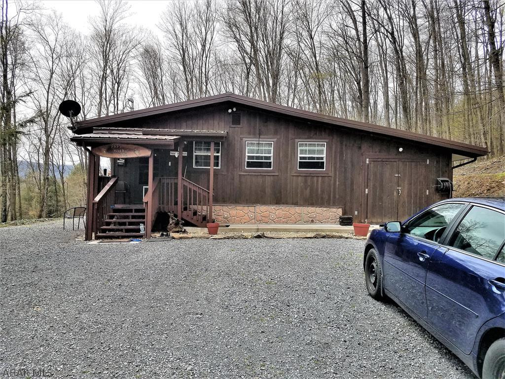 Are you ready for the quiet country life?  Then come and check out this charming ranch home.  Totally remodeled in 2006, this home offers convenient one floor living.  The kitchen, with an eat in dining area, combines with the living room for an open concept floor plan.  The primary bedroom contains a walk-in closet.  The bathroom/laundry room is spacious.  You can sip your coffee or tea on the covered porch and listen to the sounds of nature.  This cozy gem is conveniently located approximately 1/2 way between Bedford, PA and Cumberland, MD.  It allow easy access to Shawnee State Park, Interstate 68, Rocky Gap State Park and also State Game Lands.  Come take a look, it may be the place for you.  It could be a great weekend getaway or a permanent residence.