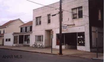 3 buildings with a total of 15 units 12 residential and 3 commercial TWO RESIDENT UNITS HAVE SEVERE FIRE DAMAGE. UNITS IN MAIN BUILDING HAVE SEPERATE HEATING UNITS. GREAT LOCATION IN MAIN BUSINESS DISTRICT, 24/48 HOUR NOTICE. TENANTS PAY ALL UTILITIES IN MAIN BUILDING. OTHERS PAY EVERYTHING BUT HEAT. SOME UNITS ARE RENTED