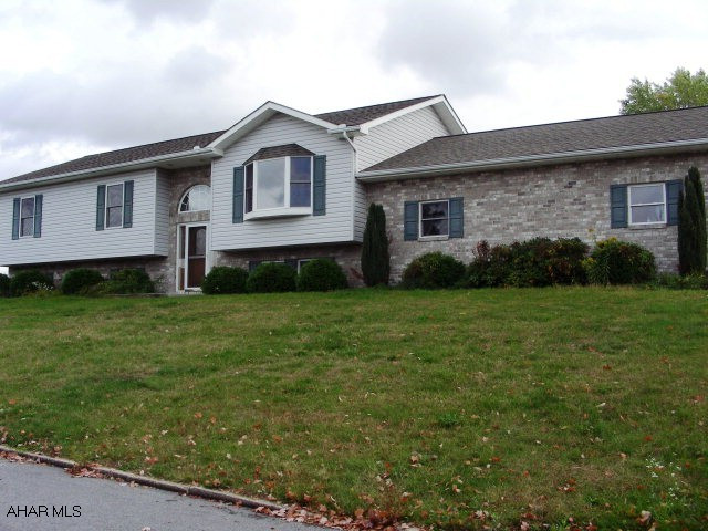 See agent for Purchase Contract Addendum.  Large corner lot.  Lots of kitchen cabinets.  Entrance from garage into kitchen or basement.  Some hardwood floors.