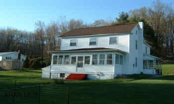 Nice 2.5 story on large lot in Cassandra.  Newer vinyl siding, roof, soffit & facia and electric service.  Four bedrooms, large rooms, first floor laundry.   $1,500 tap in fee for sewer already paid. Call Tony to show. Home is connected to the borough sewage system, which currently has no treatment plant and flows to a creek.  The treatment plant is under construction and the $1,500 tap-in fee has already been paid.  Call Tony for showing.