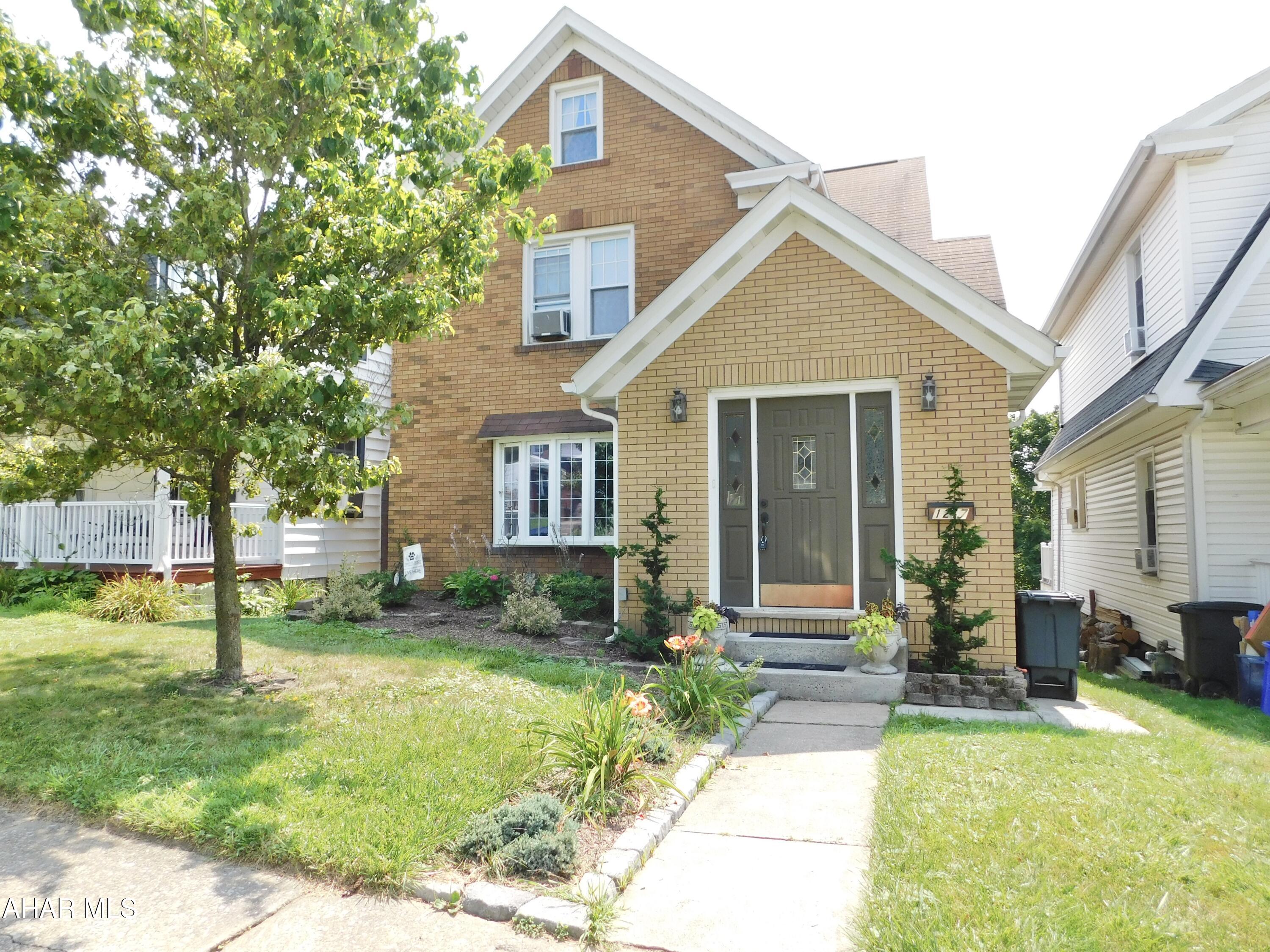 This 3 BR brick offers character & space. French doors leading to Dining Room and Library as well as hardwood floors throughout. Vinyl windows and GHW heat & updated electric. And don't forget the sunroom off kitchen that's nice & bright. Basement offers additional living space with a Rec Room and Full Bath. Nice new fencing and rear deck sets off the back yard and you can sit and enjoy the fire pit on cool evenings.
SELLER will consider a credit to add off street parking in rear next to garage with acceptable offer.