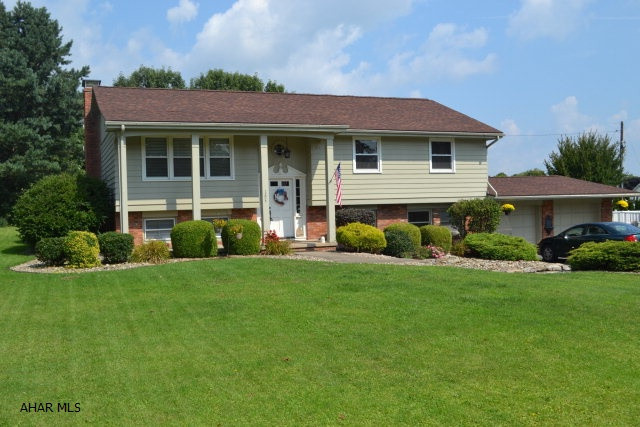 LISTED WELL BELOW most recent appraisal! Beautiful bi-level ready for you to move right in. This 3-4 BR home has your name on it.  Main level has a nice sized living room that flows into dining area, a kitchen w/appls that stay, bath, Master BR w/2 closets & it's own bath, & two more BRs.  Downstairs has many options. You'll find a den(or perfect playspace), Family room w/fireplace, & addl room for 4th BR or countless other things.  Also a half bath, laundry room w/shelves for storage, office area, & mudroom.  As if all this wasn't enough-the home also incls an attached 2 car garage.  Exterior is already attractively landscaped for you & has a near-new roof (2011), a back deck (composite-no maintenance!) with screened in area & large backyard.