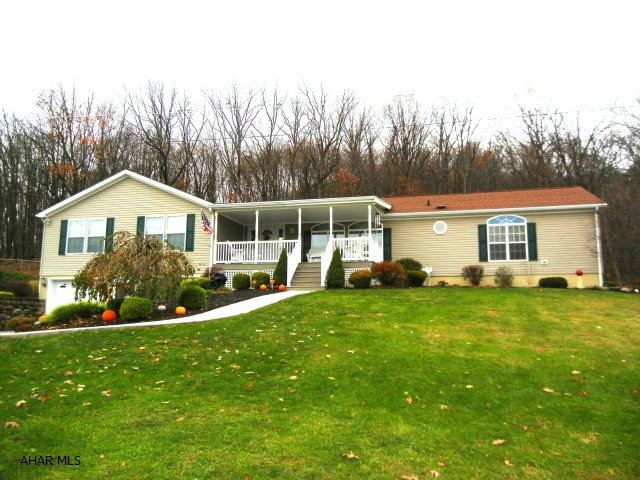 Amazingly stunning describes this one story home that offers over 2400 sq. foot. No detail overlooked. Very spacious kitchen w/eating area & french doors that lead to a large deck. Large & relaxing family room w/stone FP & bar to entertain guests. Formal dining room is bright w/large arched window. Extra wide hallways. 4th BR & 3/4 bath in basement. A car buff's dream with 4 car garage or workshop. Property lines--- seller states that it goes approx 15 feet into the woods behind the house.  In front of the house you will see a fence---that belongs to the neighbor, but the shrubs belong to the seller......Immaculate condition. Truly a Must See.