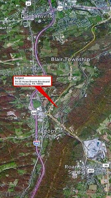 54.58 Acres, 2 access roads - 1 being 33' wide to enter fields. Property line is on Everett RR tracks.  Private, great view.  No water or sewer.  Hollidaysburg School District.  Perfect for raising live stock-including horses.  Approx 20+ ac are tillable - flat.  Great location for a gentleman farm or farmette.  Previously used for crop growing. Boundaries are marked but not by a surveyor - they are approximate. Buyer to verify taxes.