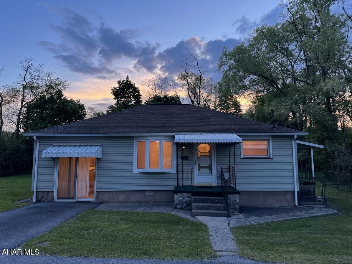 Cozy two bed room ranch with family room.  The home has a side porch and a portion of the yard has a chainlink fence for children and /or pets.
