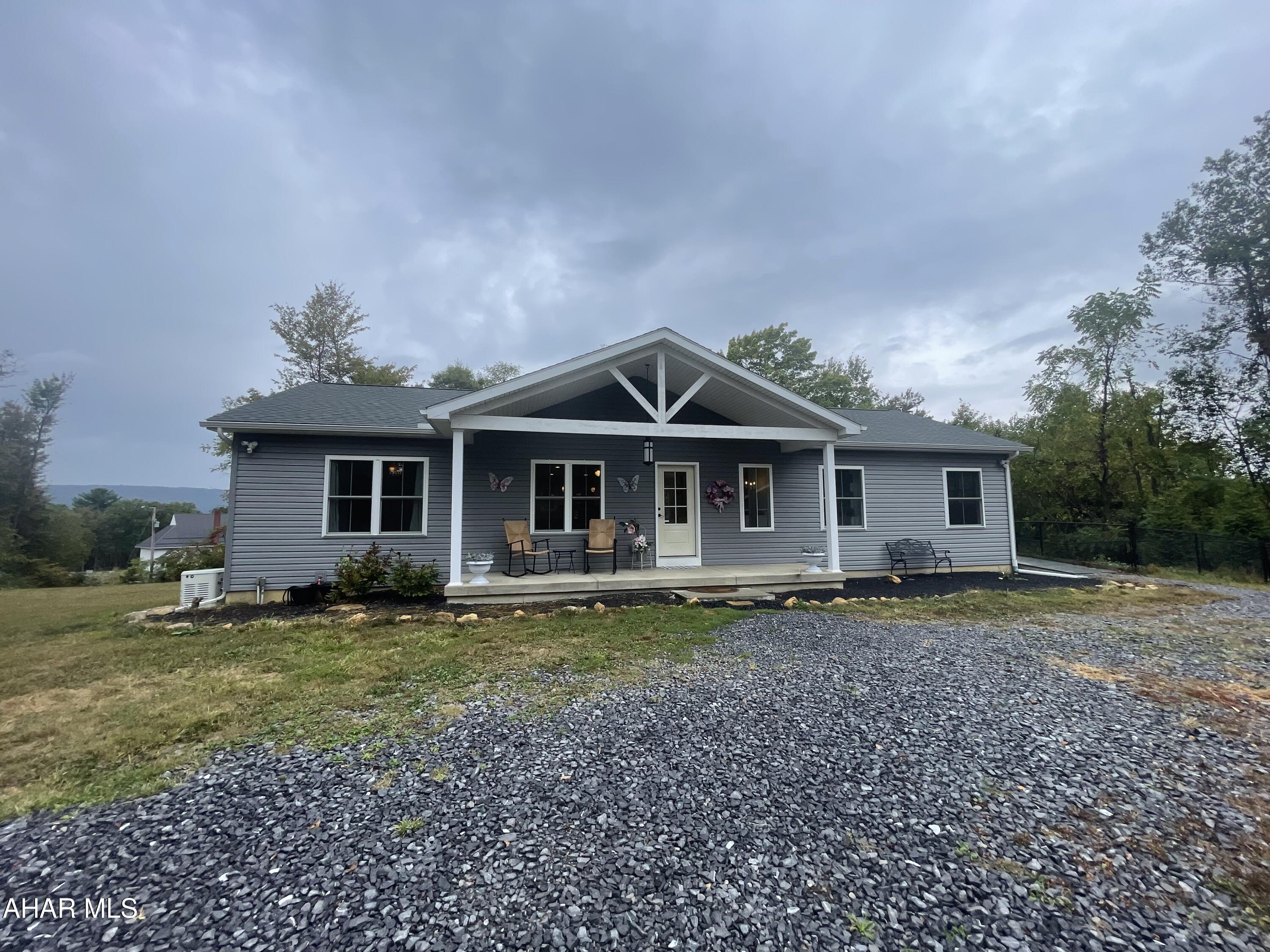 Beautiful 2020 ranch home sits on 3.68 acres! 3 bedrooms 3 baths. Open concept living area! Two tone kitchen with pantry. Dining room. Office. First floor launry room. Family room with kitchenette. Basement bedroom with full bath. Craft room. Cover patio with hot tub to enjoy those chilly evenings. Trex deck! Covered front porch with beautiful landscape driveway. Detached 3 car garage-convenient for all your mechanic needs.  Dog run!! This home is a must see!!