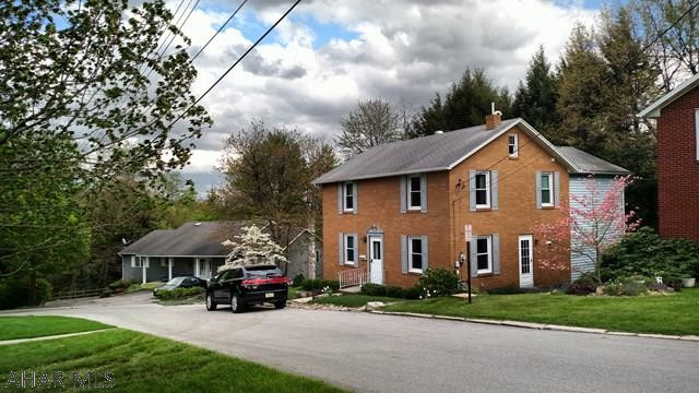 This beautifully decorated home is super clean, bright, and move-in ready.  The white oak, hardwood floors are like new and the walls have a crisp, freshly-painted look. There are 3 living areas and a private back deck that faces the woods. The kitchen and bathrooms have been nicely updated.  The utility bills are low because the exterior walls have been filled with blown insulation and the home is heated with a newer, 3-zone, high-efficiency furnace.  You will never run out of hot water because it is heated by the furnace.  The sellers have invested over $210,000 into this property, but have it priced to sell quickly. This property qualifies for a USDA loan, so you may be able to buy it with NO MONEY DOWN. Stop by our open house this Saturday, May 6th, from 1-3. You will love it!