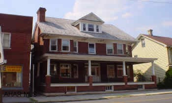 Could be used as an office building, group home, or varied commercial uses, 4 bedrooms, finished 3rd floor, 1.5 baths, metal roof, new thermopane windows on 2nd & 3rd floor, new back porch, off-street parking for 4-6 cars and fire escape.