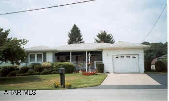 Immaculate 2 Bedroom Ranch, Sunroom, Central Air, Level lot.