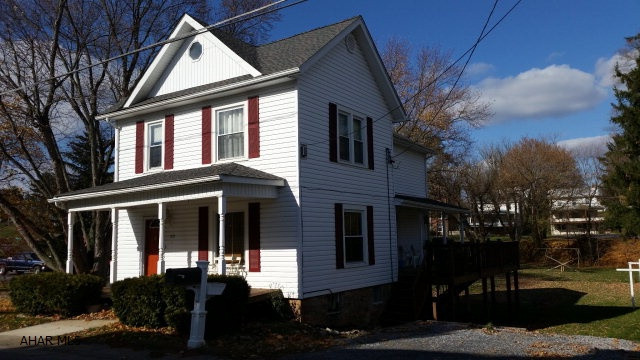 3 Bedroom plus bonus room, 2 car garage, big side deck. Nice playground for children boards this property. Heat is oil radianting first floor and electric heat pump.