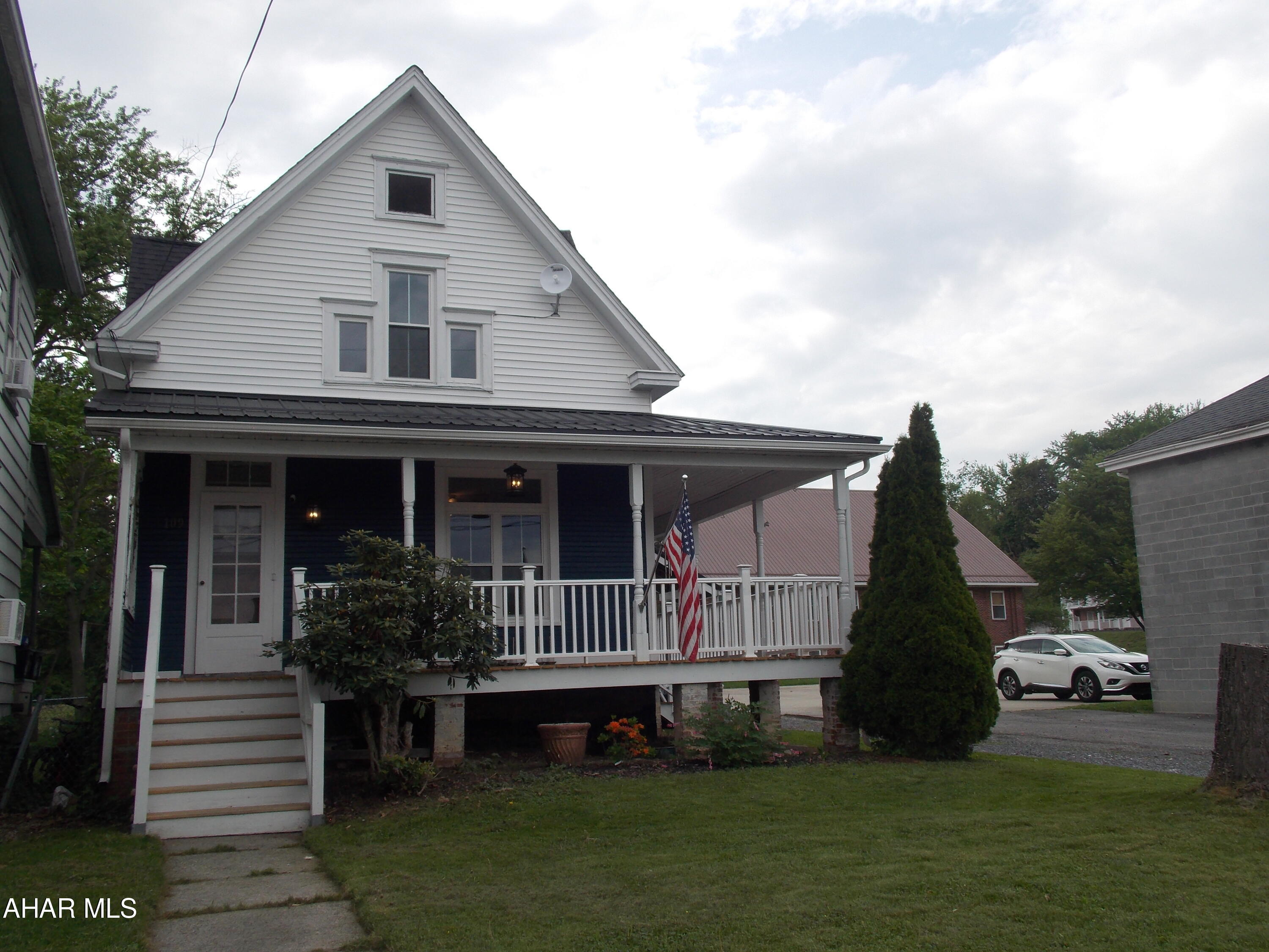 The Sellers have worked a couple of years bringing this home back to life.  You will love the new wrap around porch,  this is a perfect place to add a swing or a few rocking chairs.  The beautiful front door has been refinished and will make a great first impression. Walking around the other side of the porch you will find a brand new entry door and screen door. The first floor has been gutted and now features an open floor plan.  There is a fireplace in the familyroom  it is not functioning, but it will make a great focal point for decorating. The kitchen has beautiful new cabinets, sink and granite counter tops. All of the light fixtures are new and so are the appliances and floors. Included is a movable bar with seating and storage. There is a remodeled bath on this level as well as a laundry closet so no more going to the basement to do laundry. 
Upstairs is a lovely new bath with ceramic tile floors a beautiful new soaking tub and new sink and toilet. The carpet on the steps, hall and bedrooms is brand new. 
All of the knob and tube has been removed and a new 220 breaker box was added. Every window but one has been replaced, the house roof was replaced in 2020 and the porch and carport roof was replaced in 2022. A new gas boiler and water heater were installed in 2019 and PEX plumbing in 2019-2023.
So much of the work is done now a new owner just needs to add their touch. A full list of upgrades included with the listing.
Call to schedule a showing ASAP!