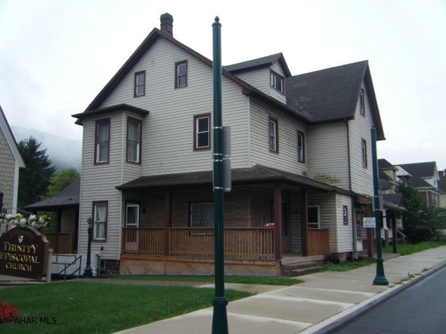 Handyman special. Classic, older home. Had lots of dogs and cats inside. Smell is still prevalent. The home has 2 entrys in the front since it had been partially incorporated to be a double home.