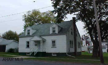 Excellent condition-new kitchen, windows, roof, vinyl siding,. Large flat lot116x132. may have hardwood under carpet. Large closets.