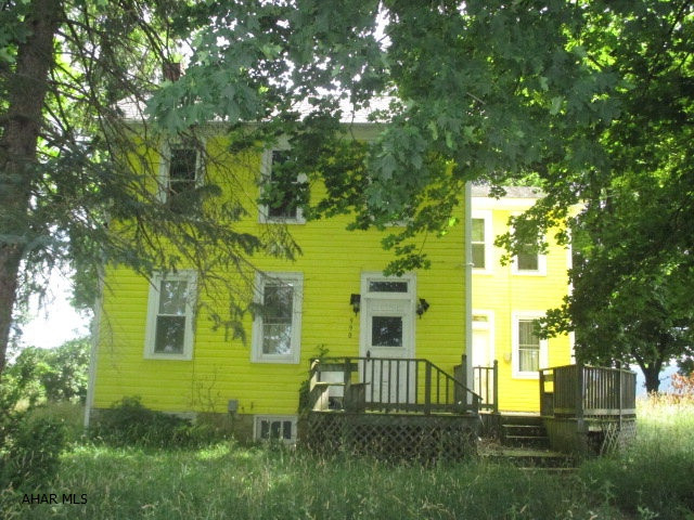 Large Williamsburg 2 story in need of major TLC. Being sold As-Is. Seller to make no repairs.