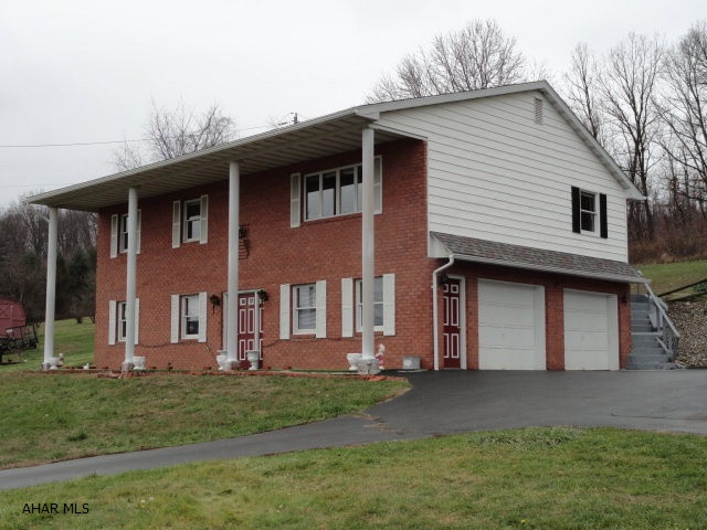 Beautiful 4 bedroom home with a million dollar view. New carpet and flooring newly painted  new radon system installed. Finished basement complete with in law sweet with kitchen, living room, bedroom and private entrance. View this beautiful home soon this one will go fast