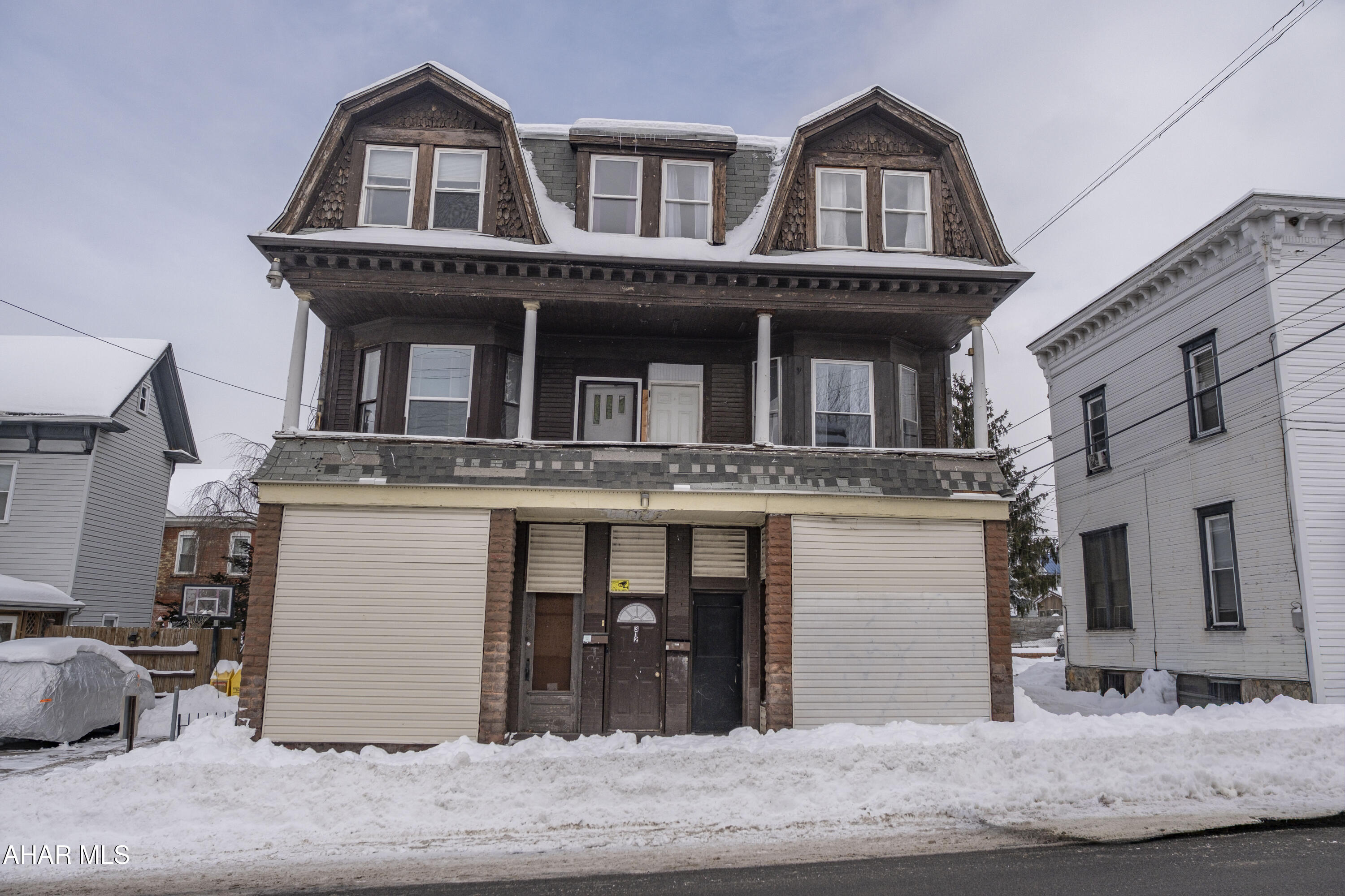 This versatile triplex offers strong potential for investors. At one time, the first floor was used as a commercial storefront. This space is now ready to be reimagined and updated. The second floor features two well-maintained residential units, each offering three bedrooms and one full bathroom. Both units have been well-maintained and provide comfortable, functional layouts. Additional highlights include separate gas and electric utilities for each unit, making this property ideal for maximizing rental income and minimizing owner expenses. Conveniently located in Altoona, this property presents a solid opportunity to add value and build long-term returns.