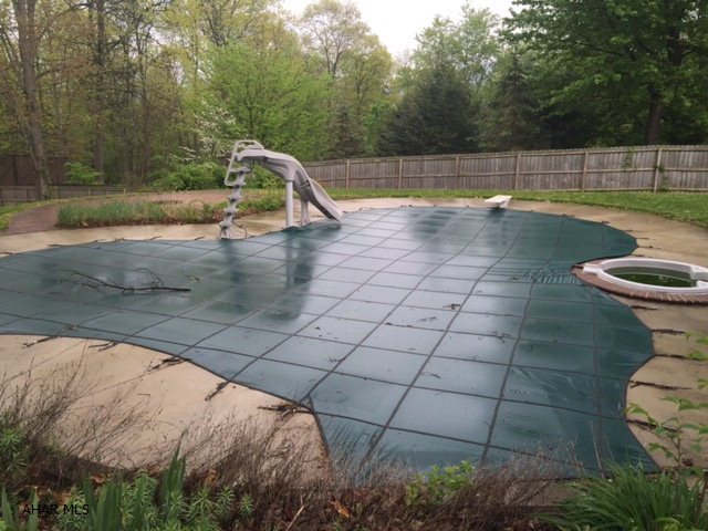Unique opportunity to build your dream home immediately.  Property includes full foundation, paved driveway, well, public sewer, and electric to property.  Expansive outdoor area includes 42x24 L shaped heated pool with sliding board and hot tub.  Many possibilities, call for more details.