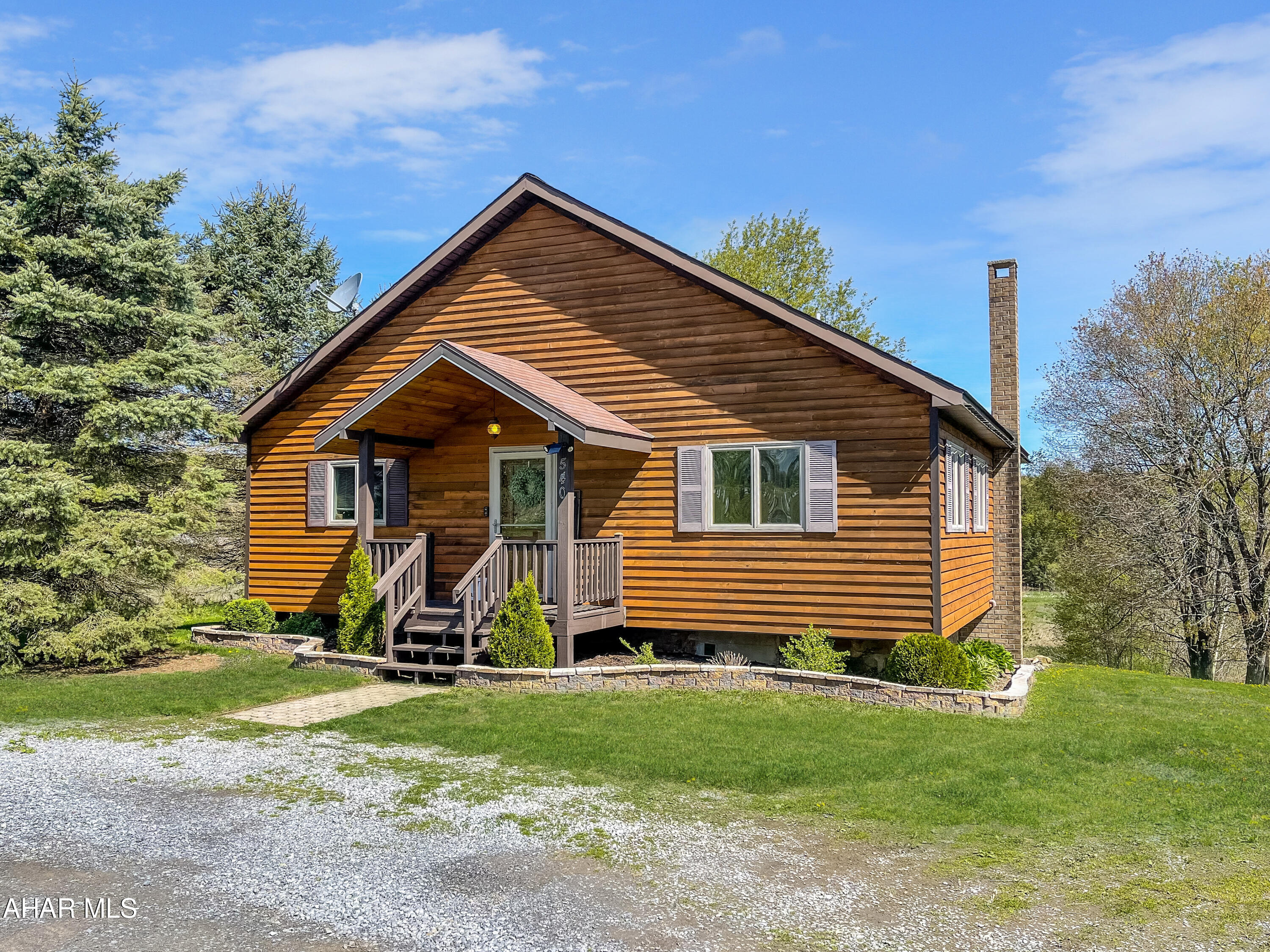 OFFER DEADLINE, THURSDAY THE 11TH AT 11AM. Welcome to 540 Pike Road in the Central Cambria School Districts. This beautiful wood sided home is the perfect combination of seclusion & convenience. As you enter the main floor of the home you will be greeted by an extremely open floor plan & tall cathedral ceilings. The entry level floor features a spacious eat-in kitchen w/ included appliances, sprawling living area w/ sliding glass door to large rear deck, full updated bathroom, large bedroom, & a master bedroom w/ access to the rear deck as well. The basement features an integral one car garage, laundry area, utility area, & an additional bedroom / office. The exterior of the property is simply immaculate. Sitting on approximately 0.6 acres w/ meticulously kept landscaping.