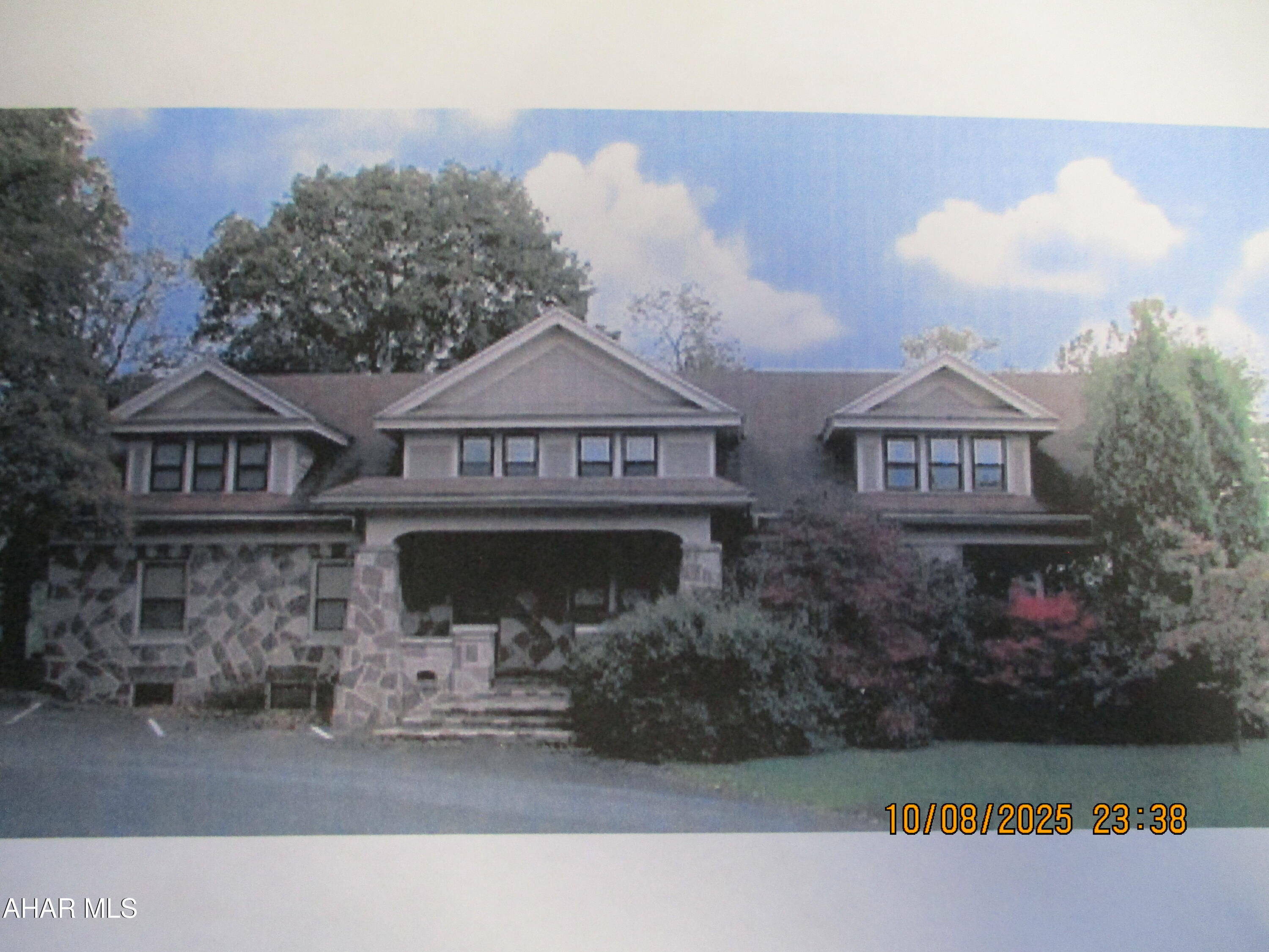 Welcome to Pine Stone Estates, nearly 4 acres of gently sloping land.   The original two story building known as the Manor House was constructed in 1938,  and contains 4150 sq. ft.  It is comprised of offices on the first floor with two 1000 sq. ft. apartments on the second floor.  Currently occupied by two small businesses, the first floor is easily converted for single occupancy.  There is a private exterior entrance to the second floor apartments.  This building is surrounded by paved parking for 18 cars plus a two vehicle carport for the apartment tenants.

Constructed of cut native red and tan sandstone, the interior boasts hand crafted woodwork and doors of native black walnut and blonde oak.  The first floor and basement are serviced by two gas forced hot air furnaces and central air conditioning units.   The apartments are heated with hot water radiators.   Window A/C units are needed.

The second large building identified as the Carriage House, is constructed of the same native sandstone and contains two floors of office space, each approximately 1000 sq. ft.  This building also features separate forced hot air furnaces and central air conditioning units.  Each floor features modern office space with two restrooms.  There is an interior entrance to the second floor as well as a private exterior entrance.  This building is easily converted to a single user.   Private paved parking surrounds the building.  The second floor of the Carriage House is   now occupied .

A third building of frame construction is a stable with six horse stalls but it needs to be repaired.   It has electricity and water but is unheated.

Full address is 1716-1720 Plank Road.