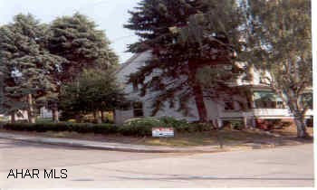 Beautiful large corner lot - New roof and windows. Wonderful large home.  Needs a little interior TLC.  Finished attic can be 4th Bedroom