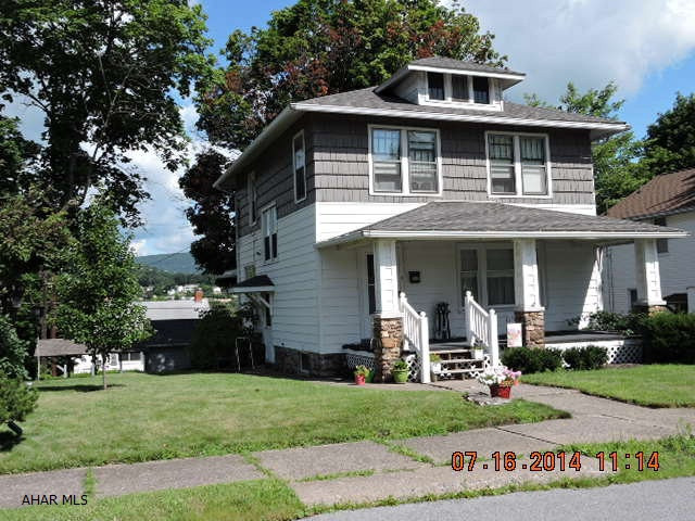 Well cared for home on nice corner lot.  Big rooms.  New bath on 2nd floor. First floor 3/4 bath off pantry.  Garage with attached car port.  Freshly painted inside.  New stove & hot water tank.  Window treatments do not stay.