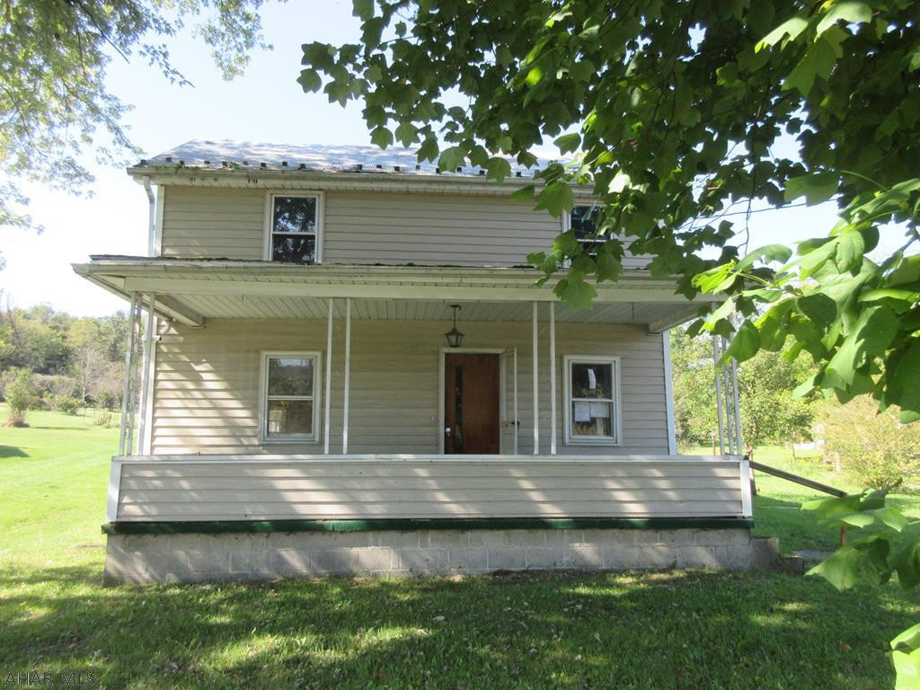 2 Story vinyl Bedford area home on 0.5 acre lot needs TLC, but perfect for handypersons everywhere! The inside of this home has loads of possibilities for anyone looking for a project home in a nice location. Oversized 2 car detached garage could be large workshop plus pole building. Property sold AS-IS. Seller will make no repairs. Offers must be submitted through HUD approved broker. Buyer pays both transfer taxes. Exclusive Agency. Equal Housing Opportunity. Marketed by Olympus AMS www.olympusams-re.com. www.HUDHomestore.com