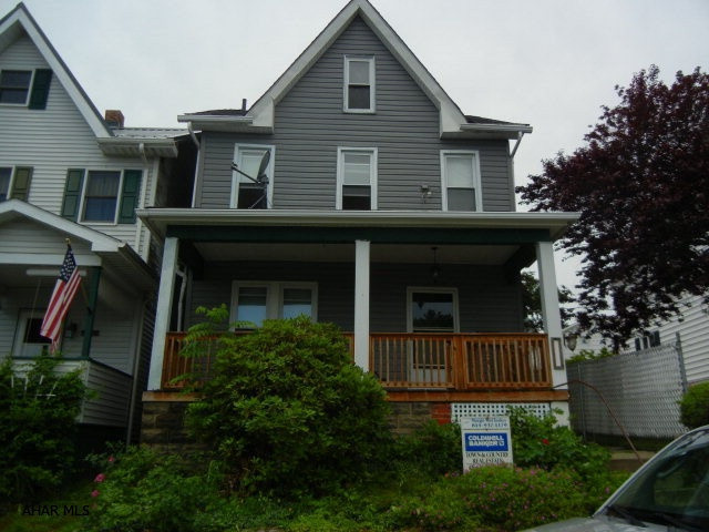 Large kitchen with lots of cabinets.  First floor laundry and 3/4 bath.  Parquet flooring in dining room.  Walk in closet on 2nd floor is separate from bedrooms.  Attic could be 4th bedroom.  Tilt-in windows.  New shingle roof, GFA furnace, and hot water tank.  200 amp circuit breakers.  Covered front porch and covered rear patio.  Concrete deck.  Detached 1.5 garage.  Vinyl siding in garage to finish sides of house.
