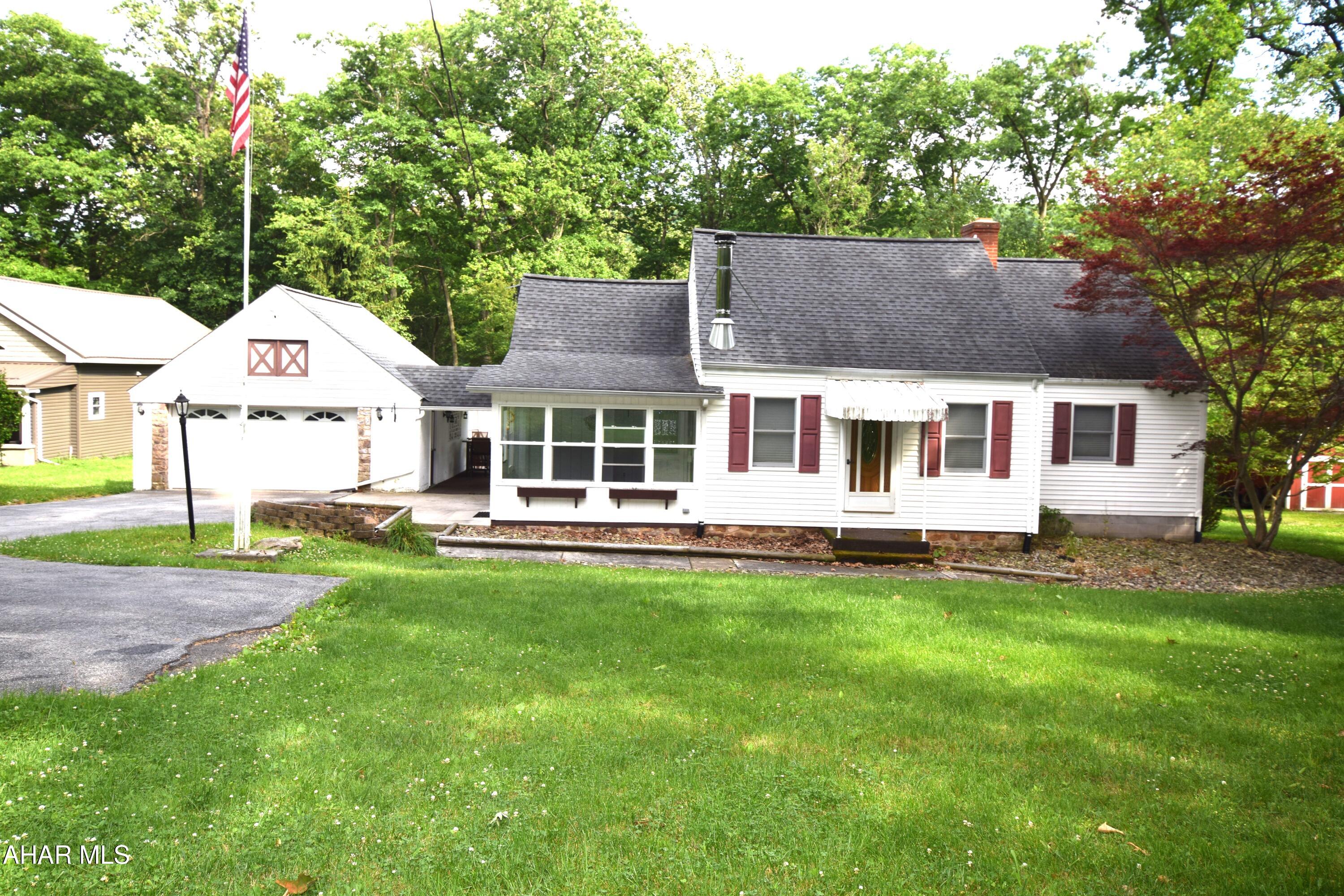 Private country living on partially wooded lot.  This nice Cape Cod style home features a modern kitchen and open concept dining and living area.  The primary bedroom suite features a remodeled bathroom and walk-in closet.   Additional bonus room could be bedroom or den.    Second floor is third bedroom.   Central air cooling and oil forced air heat and pellet stove for extra cozy winter nights.  The huge lot features a gazebo and firepit area and ends at the stream in back.   There is an outdoor seating area beside the garage.   This is a great property to destress and enjoy the great outdoors!
