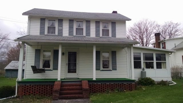Adorable 2.5 story vinyl, updated windows, CA, .80 acres flat lot, 2 car detached garage - cute package, motivated seller - bring offers!