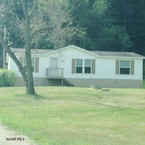 Beautiful open floor plan , well maintained. New carpet and flooring, well and septic (stream discharge system ) Rural living at its best !