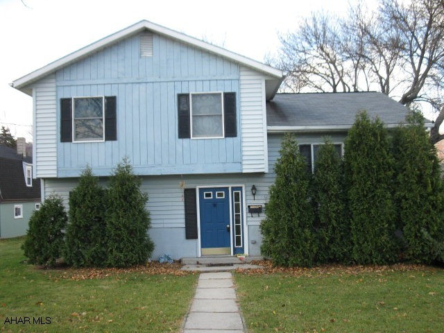 Great Potential for Handyman or Contractor. Small 3 bed 2 bath split level in great neighborhood near the football field. One car integral garage, enclosed screened porch, nice level yard with off street parking.  Home has freeze damage and needs TLC. Property being sold in As Is condition.