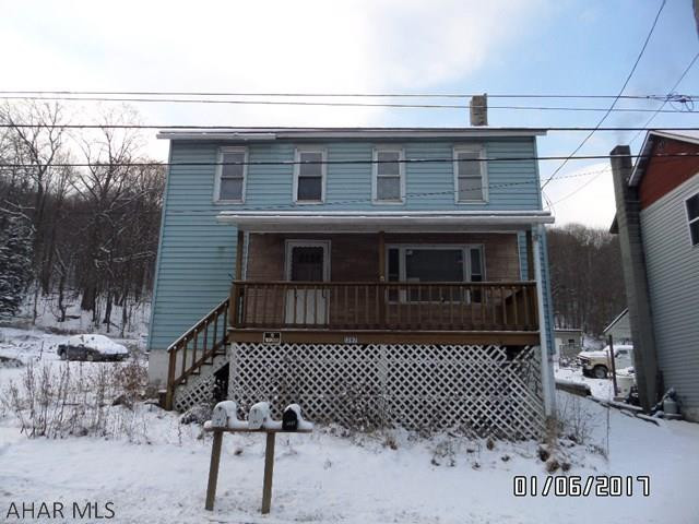 Some tlc would make this a great home, huge living room and kitchen with modern cupboards, 2 full baths, house must be connected to public sewer, worth a look