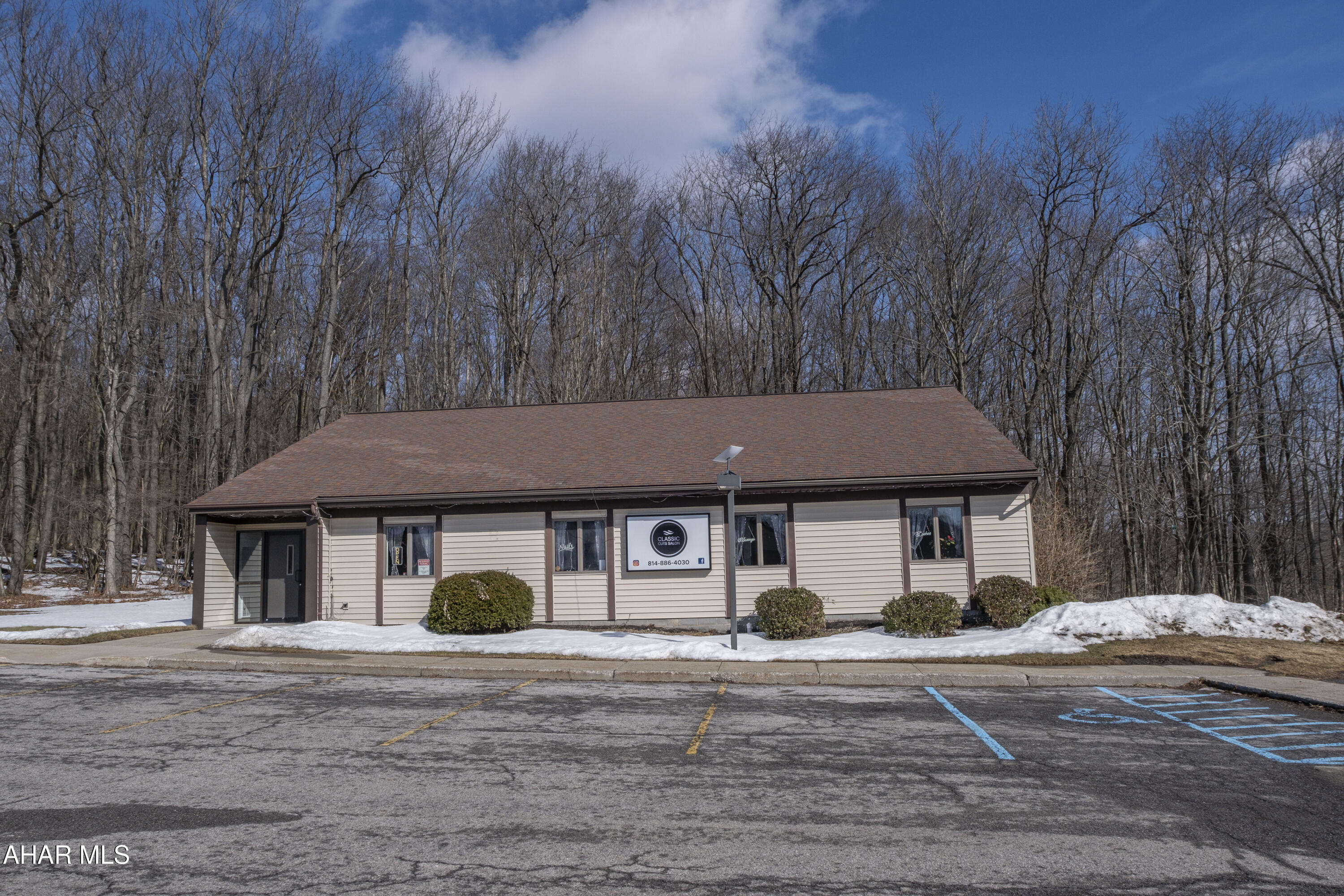 Turnkey Commercial Opportunity in the Heart of Cresson - 794 Gallitzin Road.
Incredible opportunity to own a highly versatile commercial property in Cresson, PA. Located at 794 Gallitzin Road, this well-maintained 3,200± sq. ft. single-story building (built in 1996) offers endless possibilities for investors or owner-operators alike. Formerly designed as a medical office and currently home to the thriving Classic Cuts Salon LLC, this property blends functionality, flexibility, and strong community presence. The existing layout features multiple exam/treatment rooms, a welcoming reception area, and adaptable spaces that can easily transition back to medical, office, or other professional service use if desired. Property Highlights: 
Approx. 3,200 sq. ft. commercial building Built in 1996 - solid construction with numerous updates Excellent condition and well-maintained Flexible layout suited for medical, wellness, office, or service-based businesses Established location with strong visibility Strategic Location Advantages:
Gallitzin Road serves as a key connector between Cresson and Gallitzin, providing steady traffic flow, visibility, and easy accessibility. The property benefits from proximity to Mount Aloysius College and the Main Line area, creating consistent demand from local residents, students, and surrounding communities. Established Business Presence:
Currently operating as Classic Cuts Salon LLC, a well-established and highly regarded full-service salon offering haircuts, coloring, nails, makeup, sauna, massage, lashes, spray tanning, and more. Since 2020, the business has built a loyal client base and strong book of business, making this an attractive opportunity for continued operation or investment. This property represents a prime example of a stable, service-oriented commercial investment in Cambria County -- combining a quality 1990s build, strategic location, and proven business viability. Don't miss this opportunity to own a flexible, income-producing commercial property in a growing regional corridor.