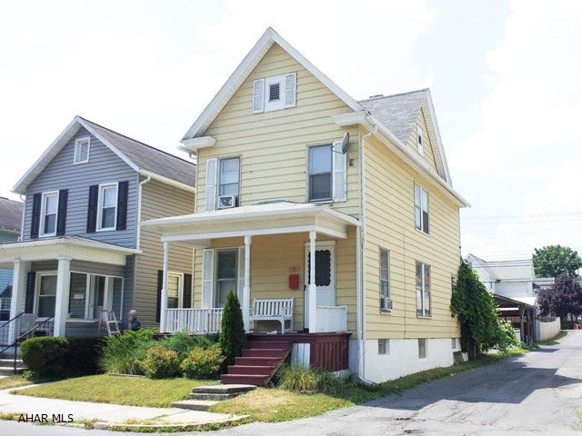Remodeled 2 1/2 story, 3 bedroom home with modern kitchen and bathroom. Covered rear deck. 2 car carport.