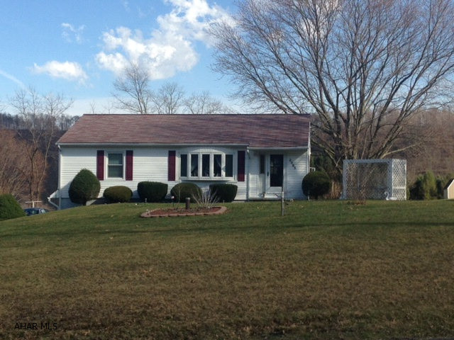 Well kept 3 bedroom, 2 bath ranch home on more than 1/2 acre. Spacious living room with large bay window. Beautiful original hardwood floors. Finished basement. Move in ready!