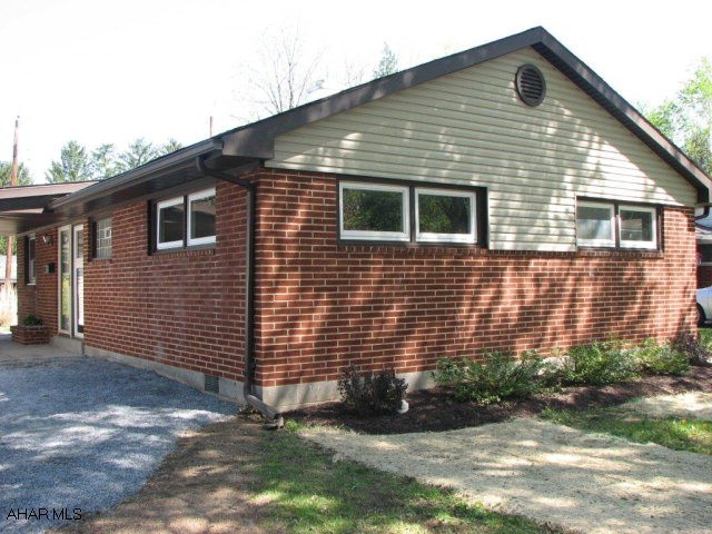 Newly redone in Hollidaysburg schools.  3 bedrooms, open floor plan, new maple kitchen and appliances, french doors onto patio and detached garage  Agent owned.  Garage size is 21 x 11.