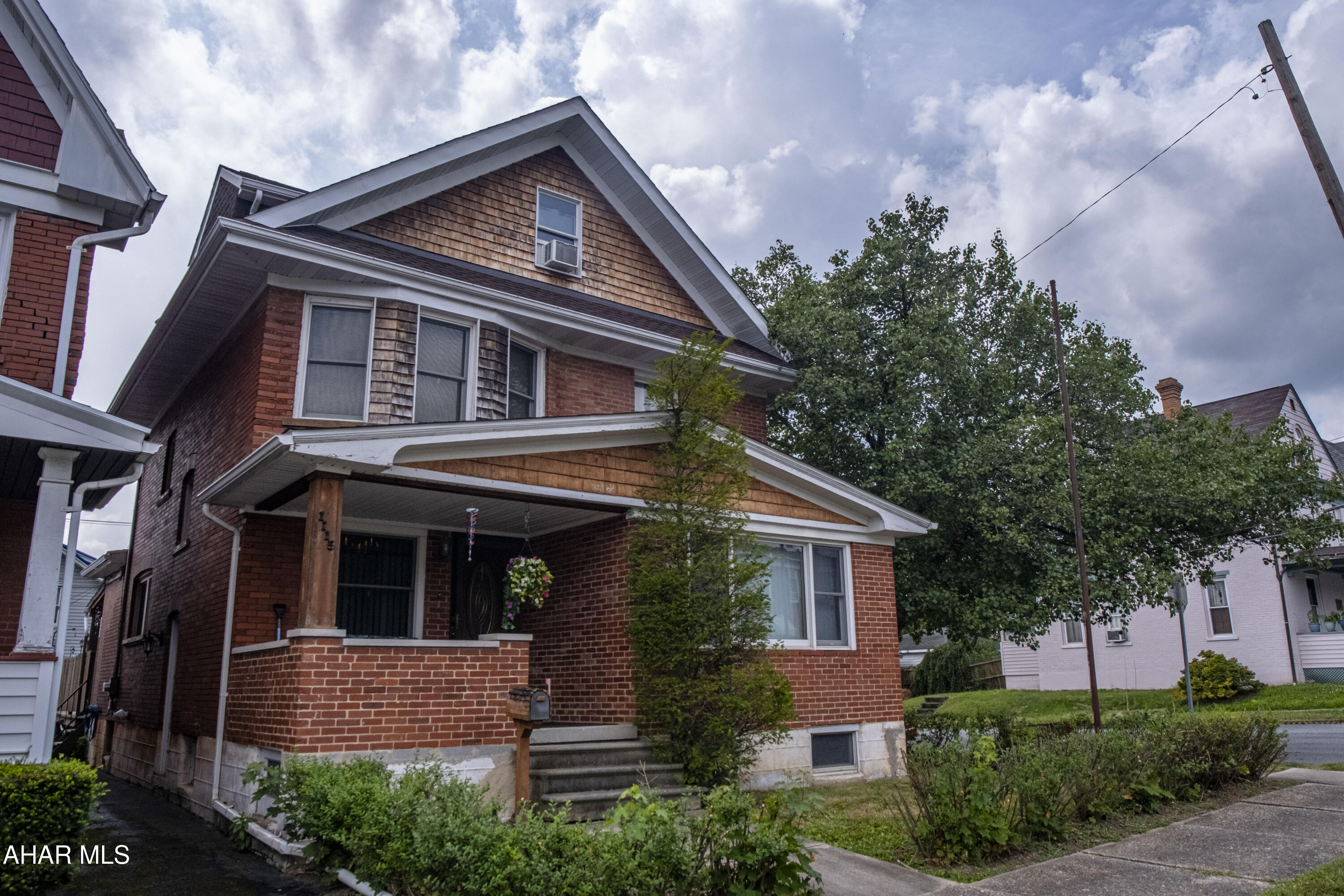 This beautiful two-story brick home exudes curb appeal and comfort. The classic red brick exterior is meticulously maintained, giving the home a timeless and sturdy feel. Inside, the spacious layout includes Four bedrooms and two full bathrooms, providing ample space for a family. A cozy fireplace serves as the centerpiece of the main living area, perfect for chilly evenings. The finished basement offers a versatile space for a family room, home gym, or office. This homes amenities included a newer, furance,roof and central air(2022-2023). Outside, a large back deck overlooks a well-kept yard, complete with an above-ground pool, creating an ideal setting for relaxation and entertaining. This home has so much to offer. Schedule your tour today.